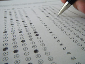 Filling out a test answer sheet to be scanned and graded with Remark Solutions