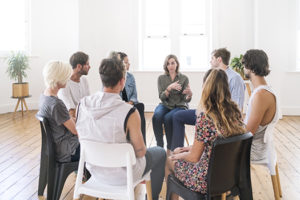 Support group gathering for a meeting