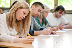 group of students take a test in class